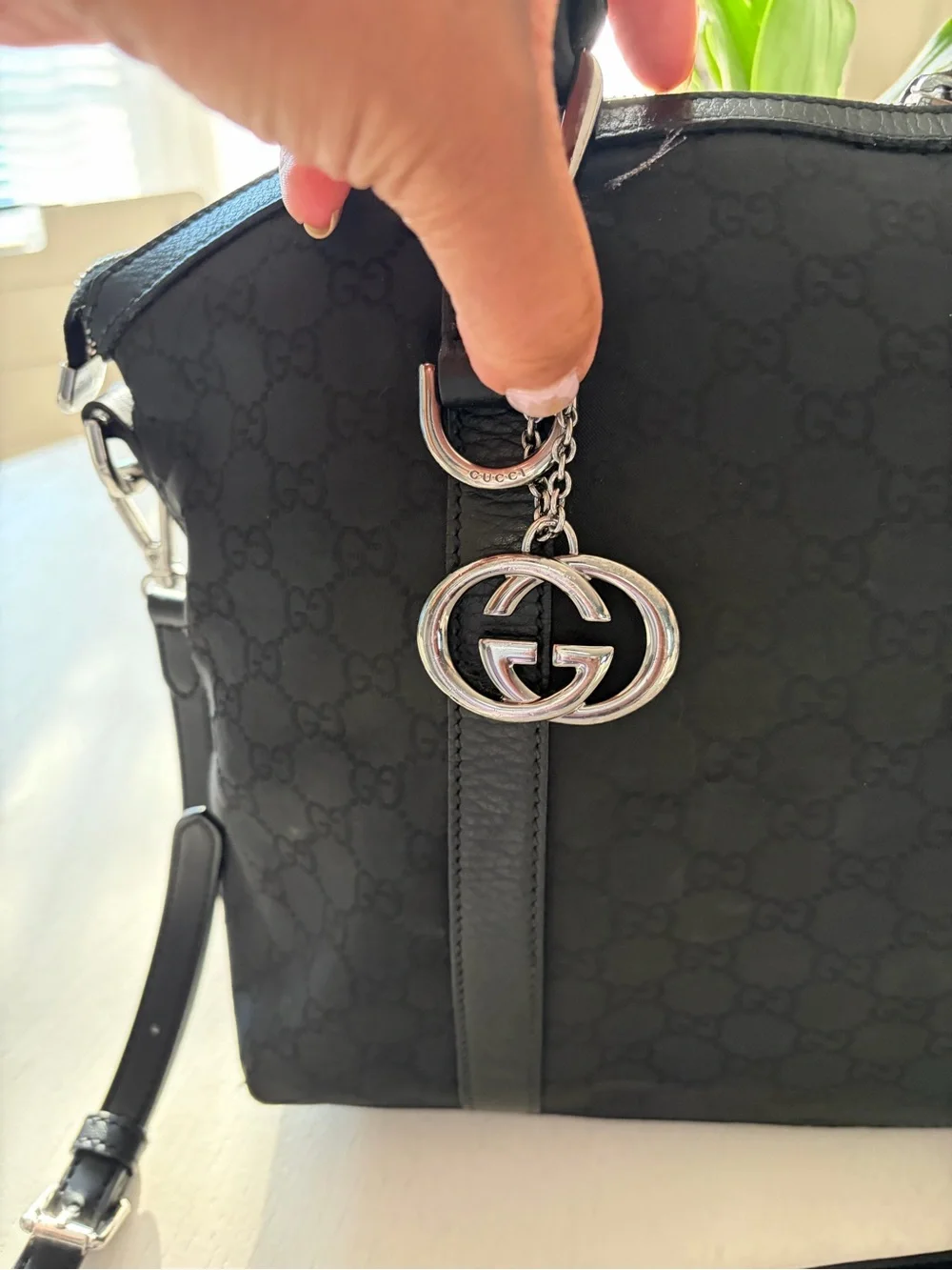 Gucci Black GG Charm Dome Satchel featuring silver-tone hardware